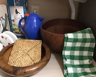 Wooden salad bowls and tea kettle