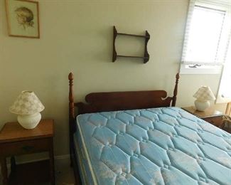full bedroom with (2) nightstands and tall boy dresser