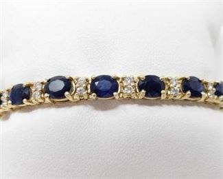 # 19 -14k Gold Diamond and Sapphire Bracelet, 21.7g
Weighs approx 21.7g, measures approx 7" long