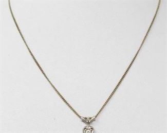 #60: 18k White Gold Diamond Pendent on a 14k Chain, 2.7g
Pendent and chain together weigh approx 2.7g, chain measures approx 15"