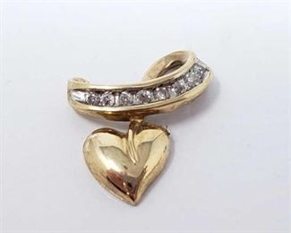 #202: 10k Gold Pendent with Diamonds, 1.4g
Weighs approx 1.4g
