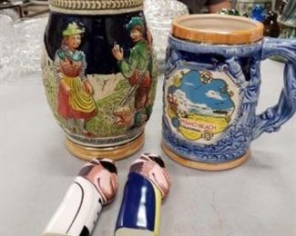 #1109: German Beer Steins and 2 Vintage Camel Lighters
Measurements in description