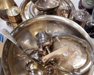 #1115: Large lot of Approximately 30 pieces of silver plated pieces
Serving trays, water pitcher, Tea pitcher, wine glasses, soup spoon, bowls and more
