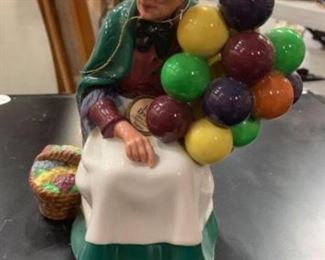 #1120: This Royal Doulton HN 1315 Old Balloon Seller figurine measures approx. 7.5"H and approx. 6.5"W Book Value $300.00
This Royal Doulton HN 1315 Old Balloon Seller figurine measures approx. 7.5"H and approx. 6.5"W (measured straight across widest point). She's in excellent condition with no chips, no cracks, and no wear Book Value 300.00