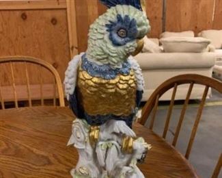 #1123: Beautiful hand-painted placed Artistiche porcelain large parrot
Measures 19 inches tall hand painted with beautiful blue and gold coloring