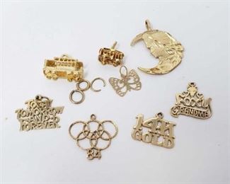 #159: Eight 14k Gold Pendents, 7.4g
Combined weigh approx 7.4g