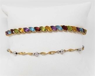 #132: Two 14k Gold Bracelets, 9.3g
Combined weigh approx 9.3g, bracelets measure approx 7" and 9"