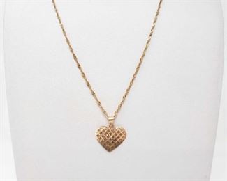 #175: 14K Gold Necklace With Heart Pendant 3.8g
14K gold necklace with heart-shaped pendant, approx. 3.8g
