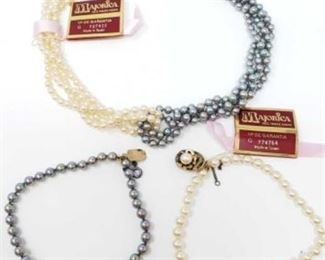 #173: Majorica Necklace and Bracelets with Sterling Silver Clasps, 60.2g
All combined weigh approx 60.2g, bracelets measure approx 8" each, necklace measures approx 15"