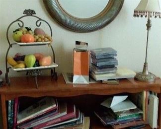 books, bookcase , mirror and home decor 