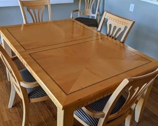 Dining table with 6 chairs and one leaf. 