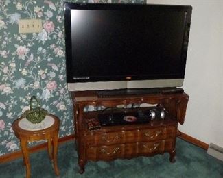 large TV / on a server with drop sides