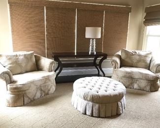 Pair of oversized chairs and tufted ottoman by Ethan Allen