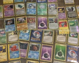 Large collection of Pokémon cards (this is just a sampling, there are hundreds of cards)