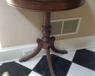 Antique demilune accent table