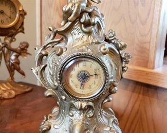 ANTIQUE CHERUB CLOCKS