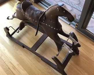 we have a second smaller antique rocking horse