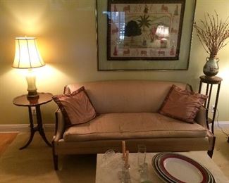 Nice sofa
Framed cloth in glass