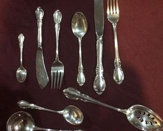 Service for 12 four piece place setting plus serving pieces