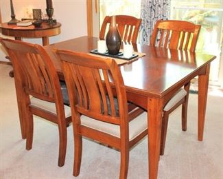 Wonderful Wood Dinette Set including an Extra Leaf with Six Chairs