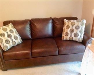Brown Ashley Furniture 2016 Sleeper Sofa w/Memory Foam Mattress. In excellent condition. We also have the same one in Charcoal Gray