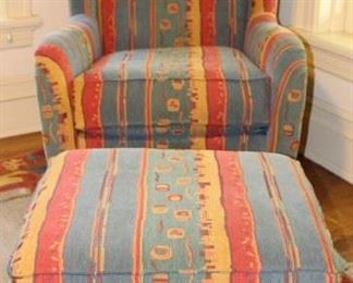 Upholstered wing back chair with matching  ottoman.