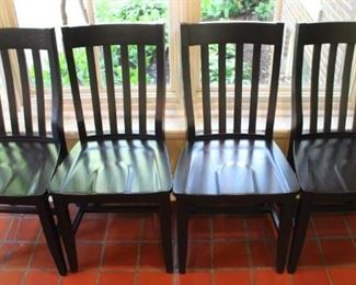 Four black Pottery Barn chairs.  
