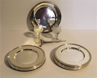Beautiful sterling serving plates, sterling ice pick, and early crystal.  The standing plate is Tiffany & Co. sterling.