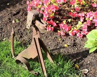 Garden dog sculpture.