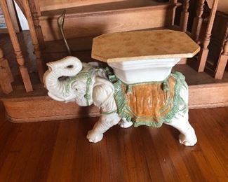 Ceramic elephant table