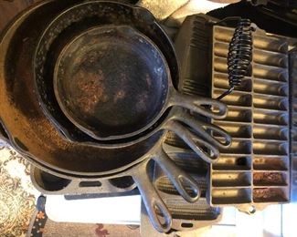  cast iron pans, trays, muffin pans