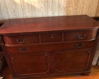 Mahogany or cherry buffet cabinet matches Duncan Phyfe style table and chairs