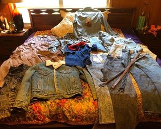 Collection of Levi’s shirts, jackets, jeans and belts.