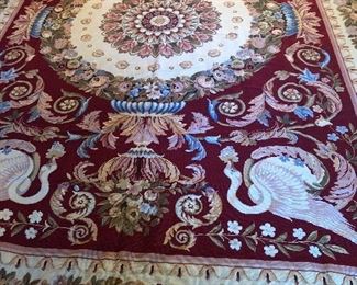 Large hand stitched rug.  On consignment