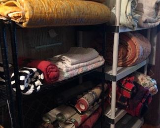 Some of the blankets, rugs, comforters