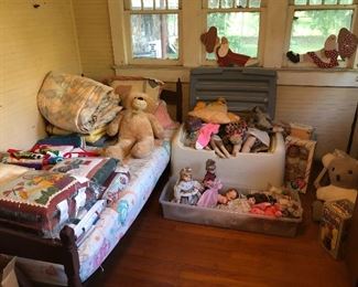 Single bed with wagon wheel design.  New quilted bedding.