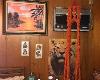 Orange picture and orange macrame are sold.