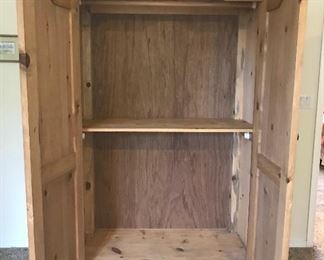 Inside of pine armoire