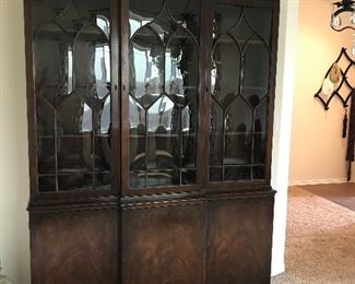 Antique china hutch with curved glass