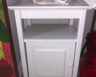 Small white storage cabinet
