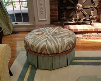 Upholstered round ottoman