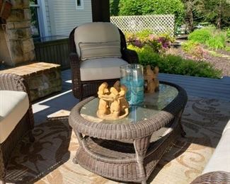 Lloyd Flanders coffee table and armchair