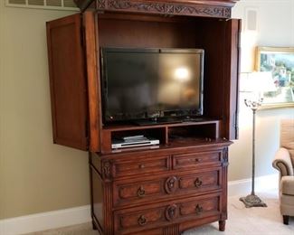 Entertainment armoire with Insigna flatscreen television