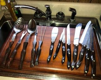 Complete set of cutco knives and four  piece utensil pieces