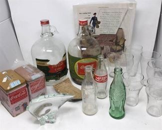 Vintage Coca-Cola Collection, including Bottles, Glasses, Tins and More         https://ctbids.com/#!/description/share/153621