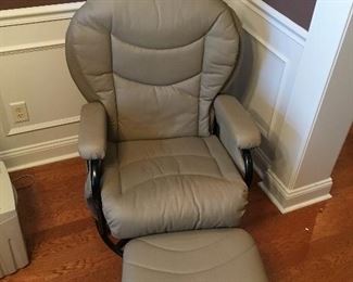 Leather glider with foot rest