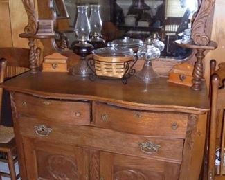 Antique oak dove tail side board w/2 doors & 3 drawers & original beveled mirror