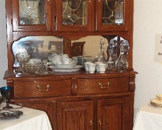 Vintage China Cabinet filled with glass and china