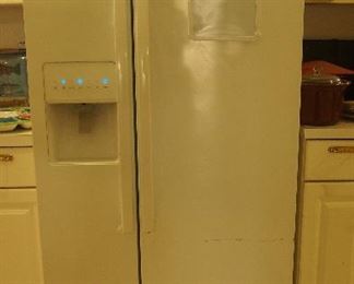 Nice Whirlpool White Side by Side Fridge (2014) selling for $350.00