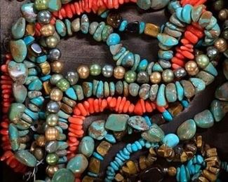 Collection of coral, turquoise, tiger's eye and freshwater pearl statement necklaces, 50% off